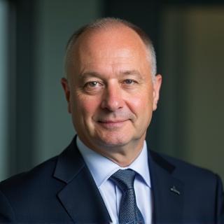 Professional photo of Dmitri Volkov, Director of Acquisitions